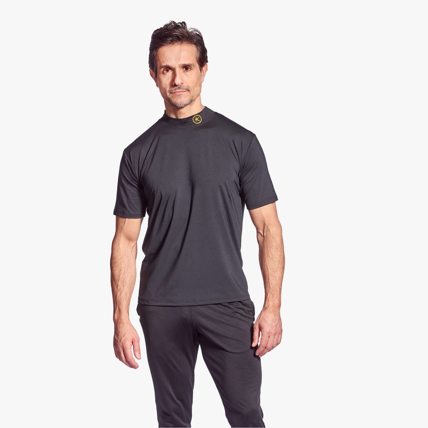 Kymira Golf Surge Mock Turtleneck Shirt – tapered seams and high collar, infrared fibres for recovery and comfort. Black