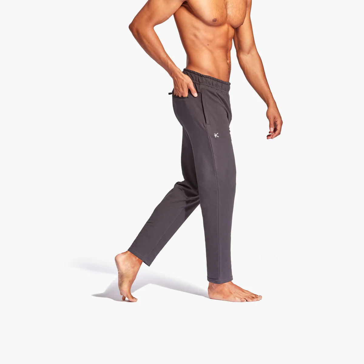 Kymira Infrared Tracksuit Bottoms for Men - Kymira’s stylish Tracksuit Bottoms for Men: infrared tech enhances recovery, reduces fatigue, loose fit for comfort, elastic waist, cuffed ankles. Perfect athleisure.