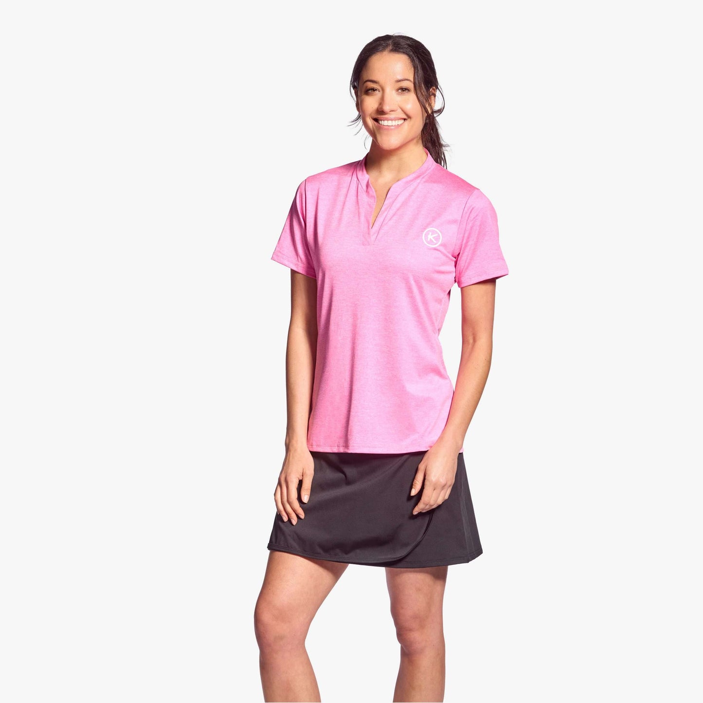 Infrared golf shirt for women - split neck, ergonomic fit, and KYnergy® tech for recovery and comfort. Pink