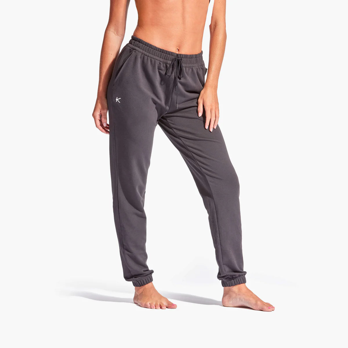 Kymira Infrared Tracksuit Bottoms for Women - Kymira’s stylish Tracksuit Bottoms for Women: infrared tech enhances recovery, reduces fatigue, loose fit for comfort, elastic waist, cuffed ankles. Perfect athleisure.