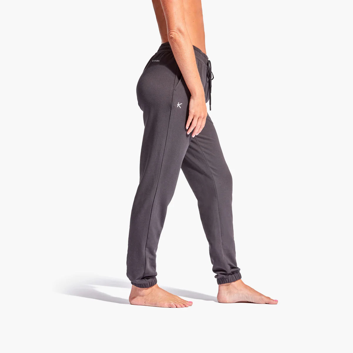 Kymira Infrared Tracksuit Bottoms for Women - Kymira’s stylish Tracksuit Bottoms for Women: infrared tech enhances recovery, reduces fatigue, loose fit for comfort, elastic waist, cuffed ankles. Perfect athleisure.