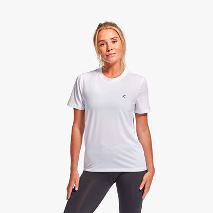 Woman wearing Kymira Women’s Infrared Recovery T-Shirt, lightweight recovery wear with infrared technology. White